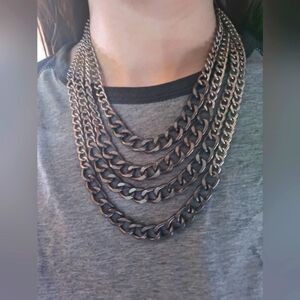 Layered chain necklace from Claire's. Metal 4 chain 3 tone with durable clasp.